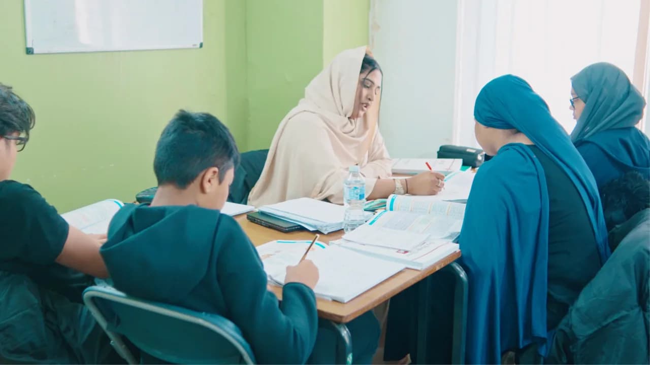 Students working on English comprehension at Excel Tutors